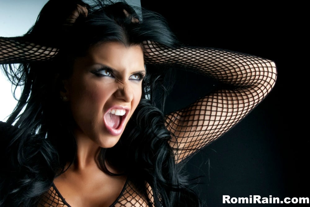 Romi Rain showing her biker booty