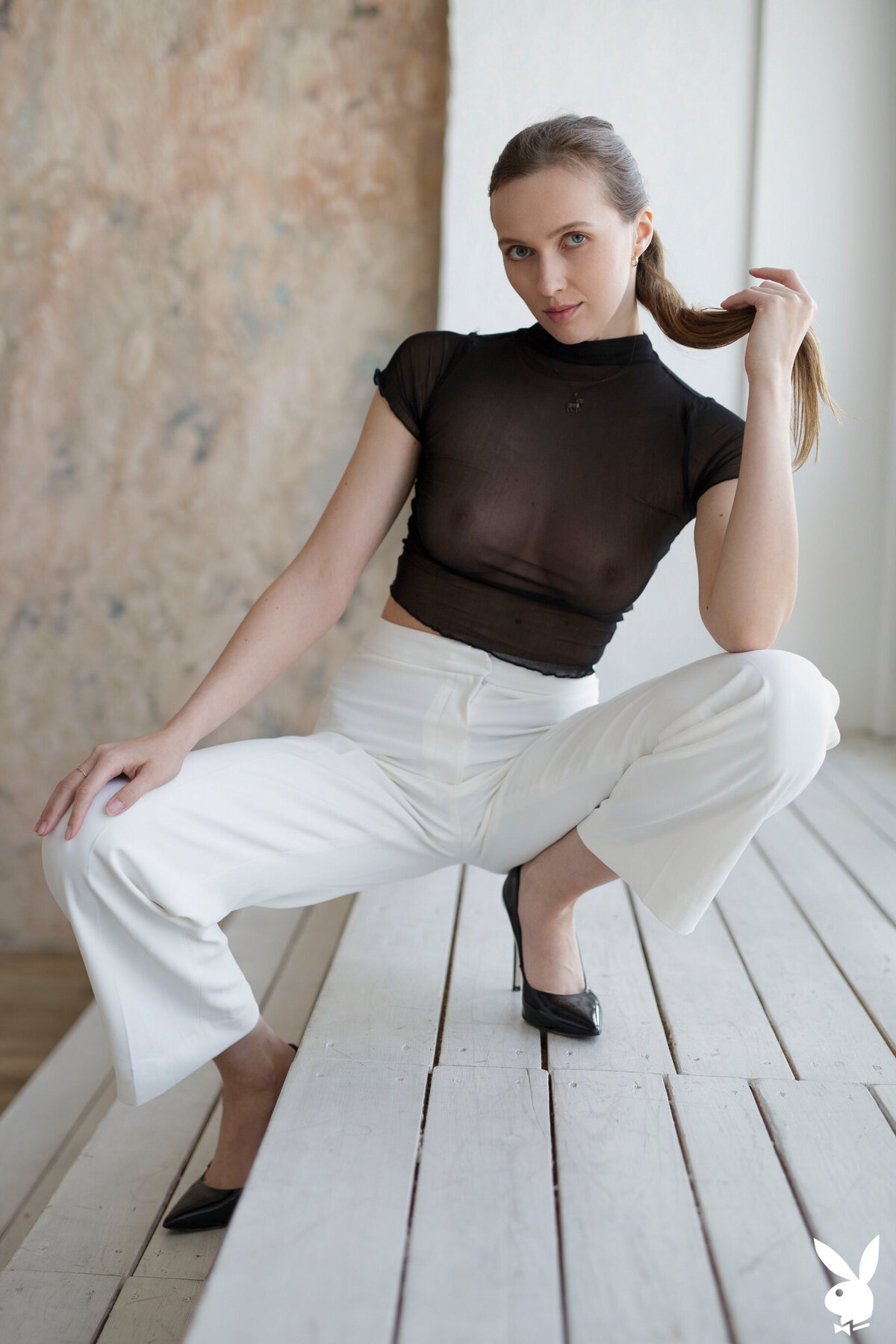 Stacy Cruz stuns in sheer blouse, hot pants, and killer heels—pure seduction