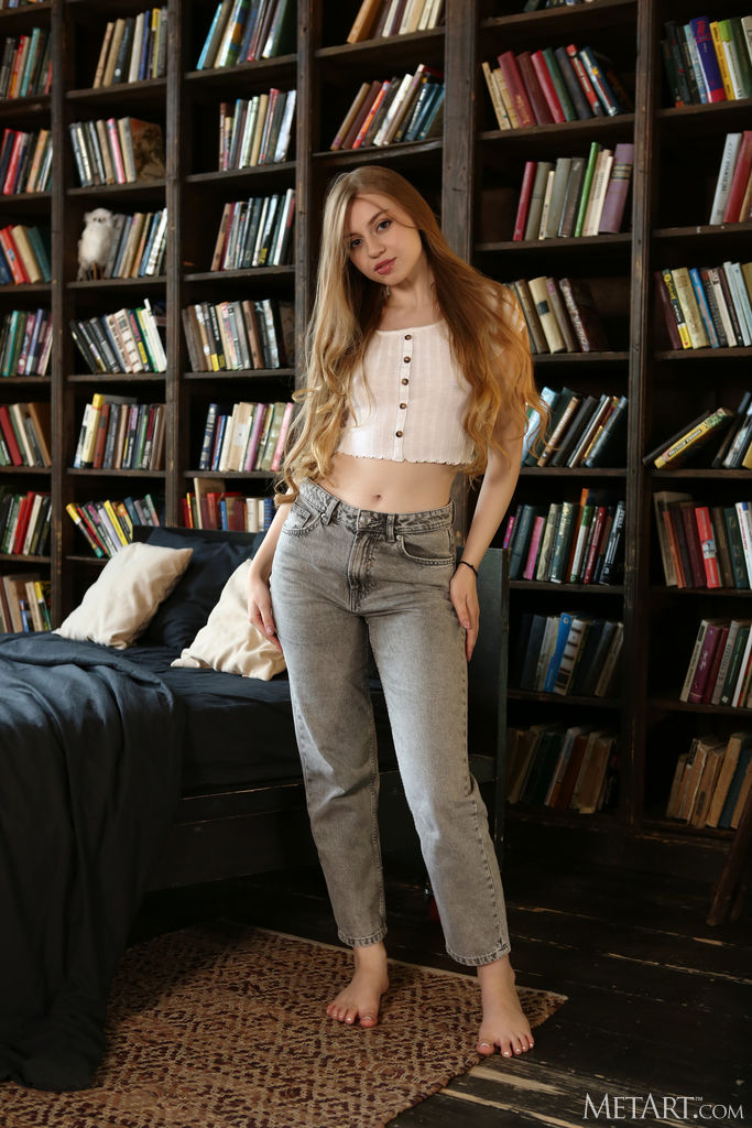 Emi Mur Wriggling Out Of Her Jeans And Lifting Her Top To Reveal Her Perky Breasts