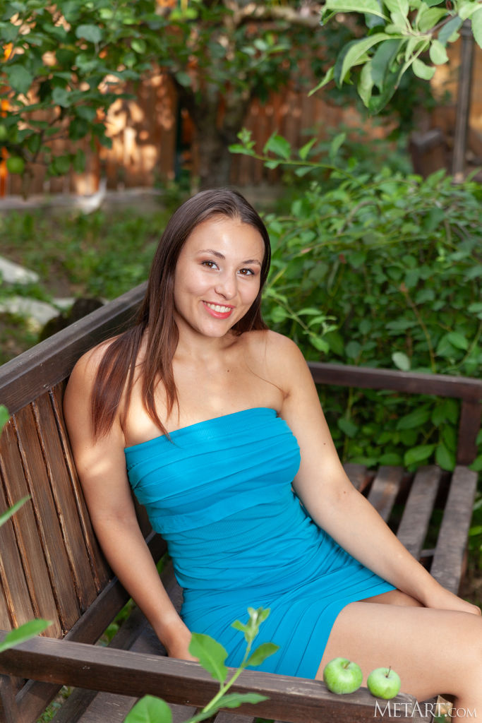 Sumiko Pulling Down Her Figure-hugging Dress In The Garden