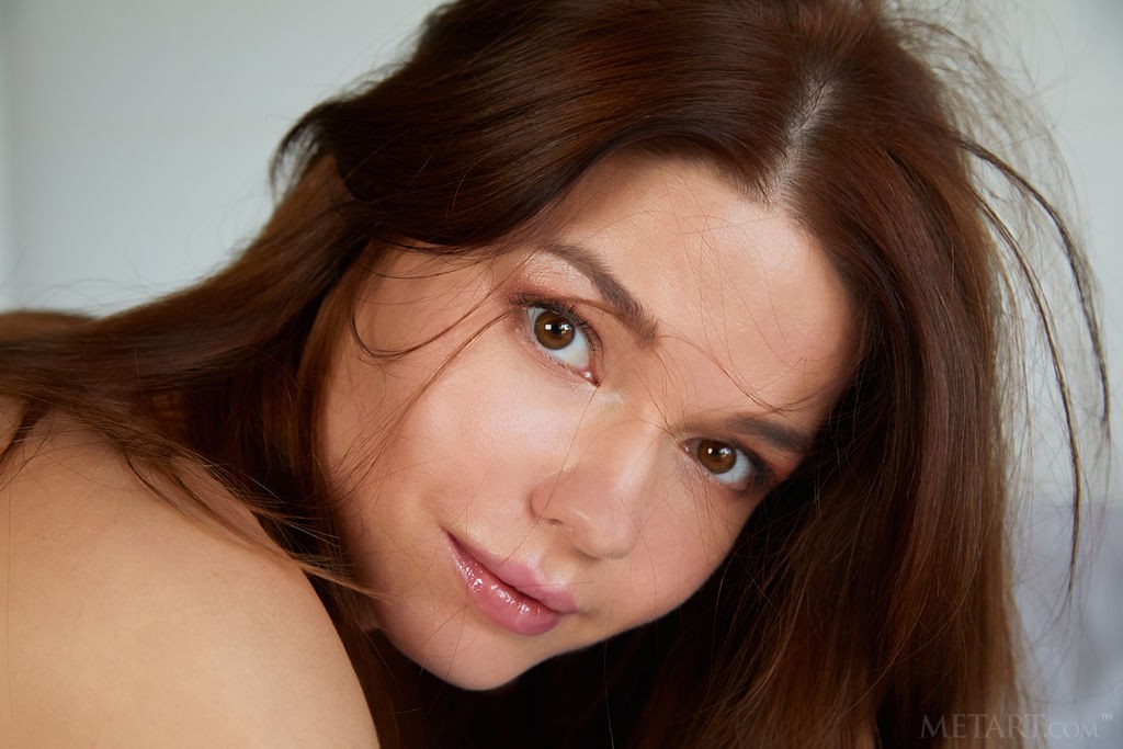 Nedda A - Hot redhead teen model excitingly poses on the bed nude