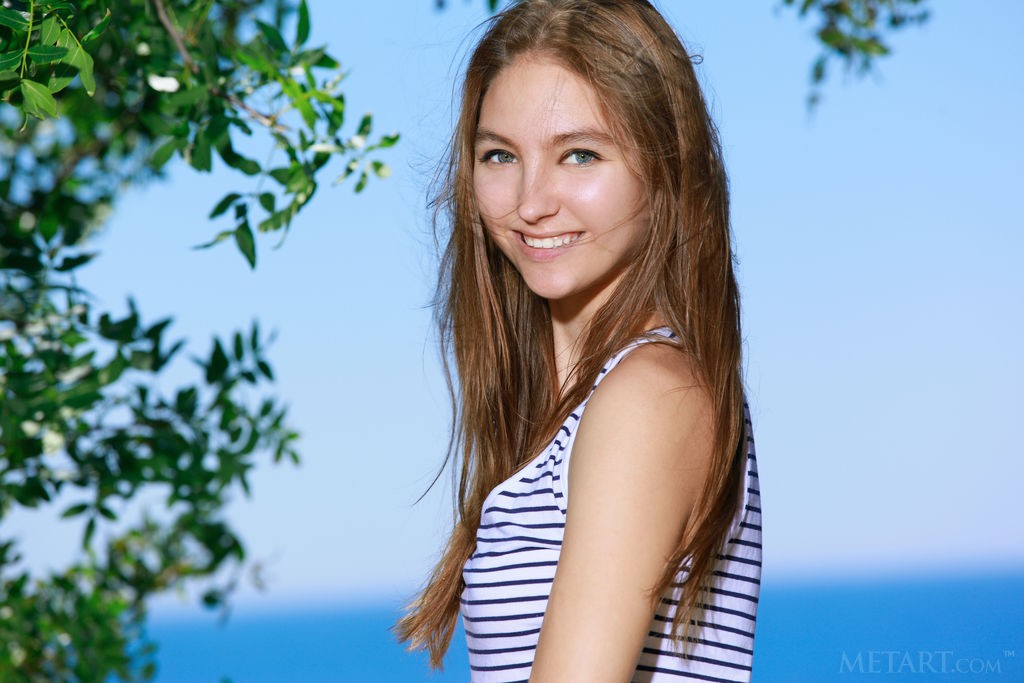 Izabel A - Naked cutie watches the sea when working out naked