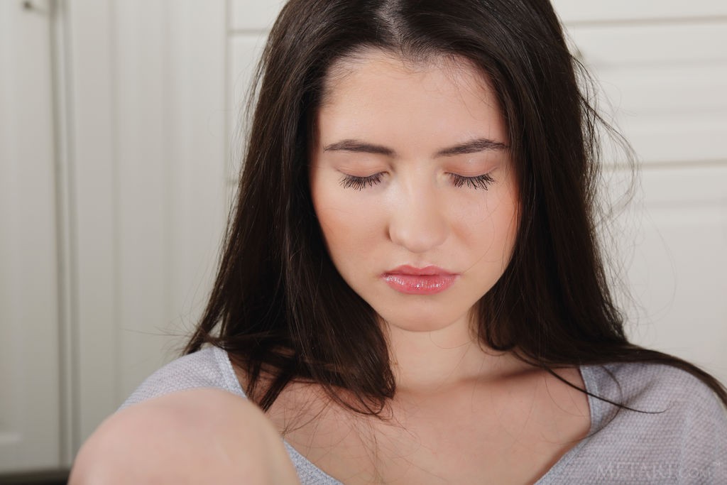 Melisia - Licking her fingers and spreading on the kitchen counter