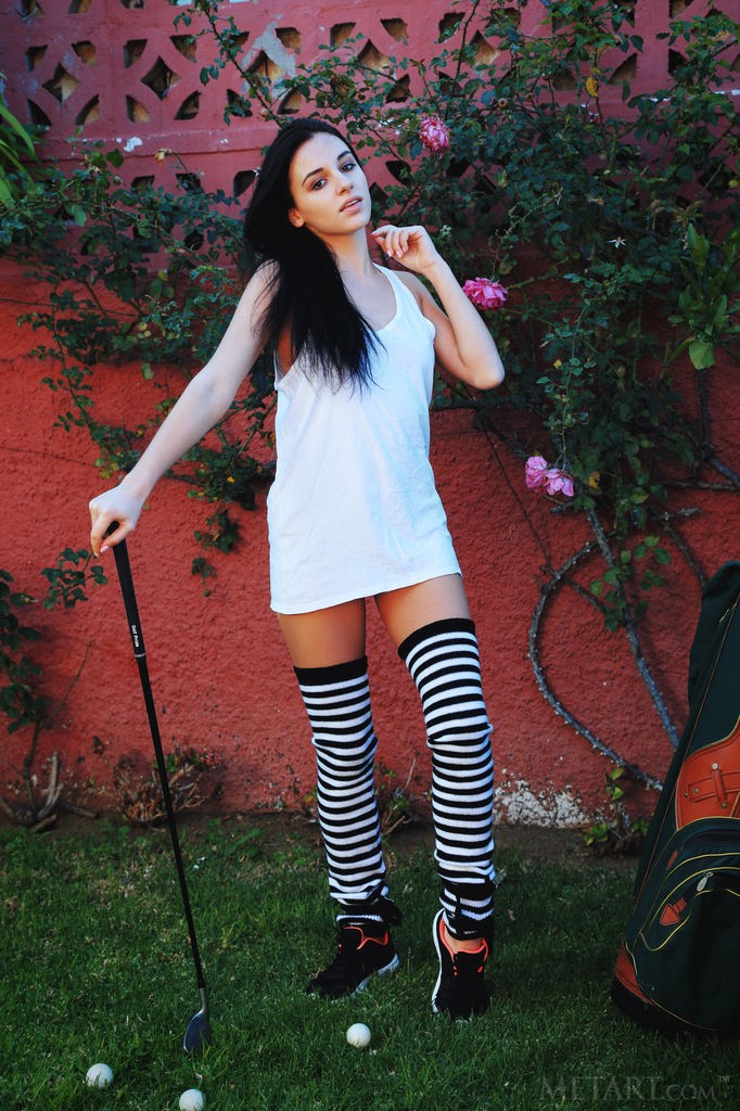 Sultana - Knee long striped socks on a beautiful barely legal brunette