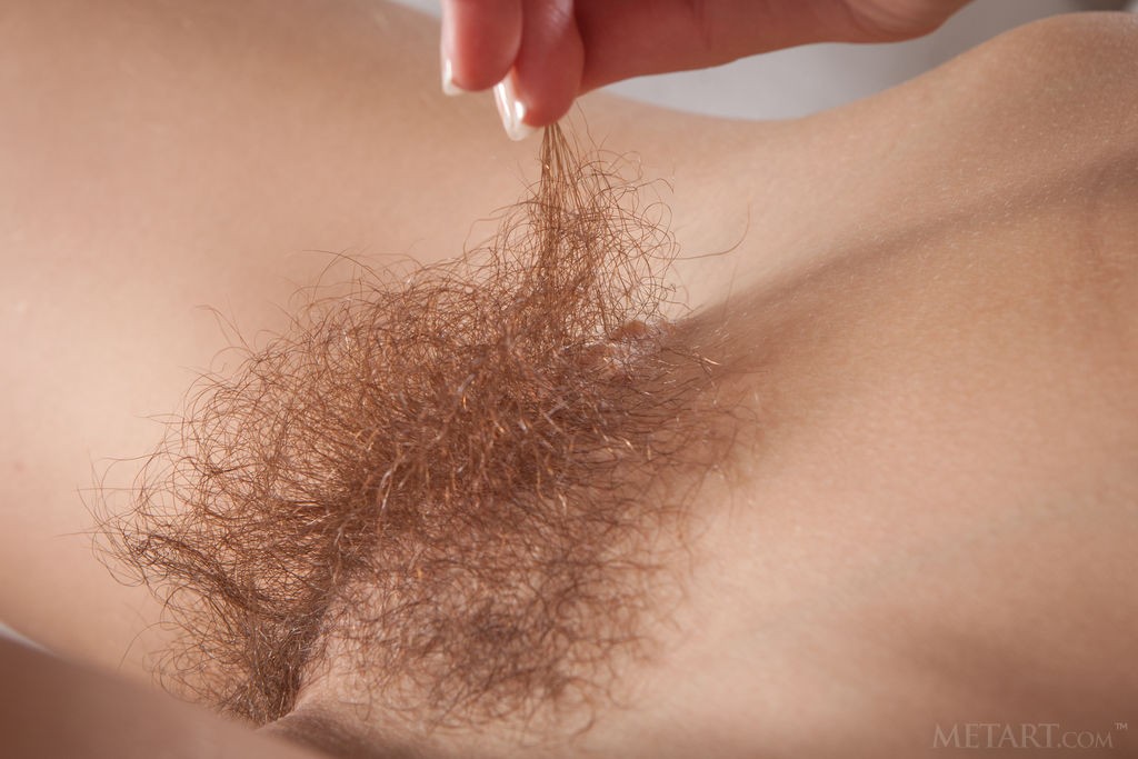 Dennie - Red-haired hottie shows the beauty of her hairy pussy