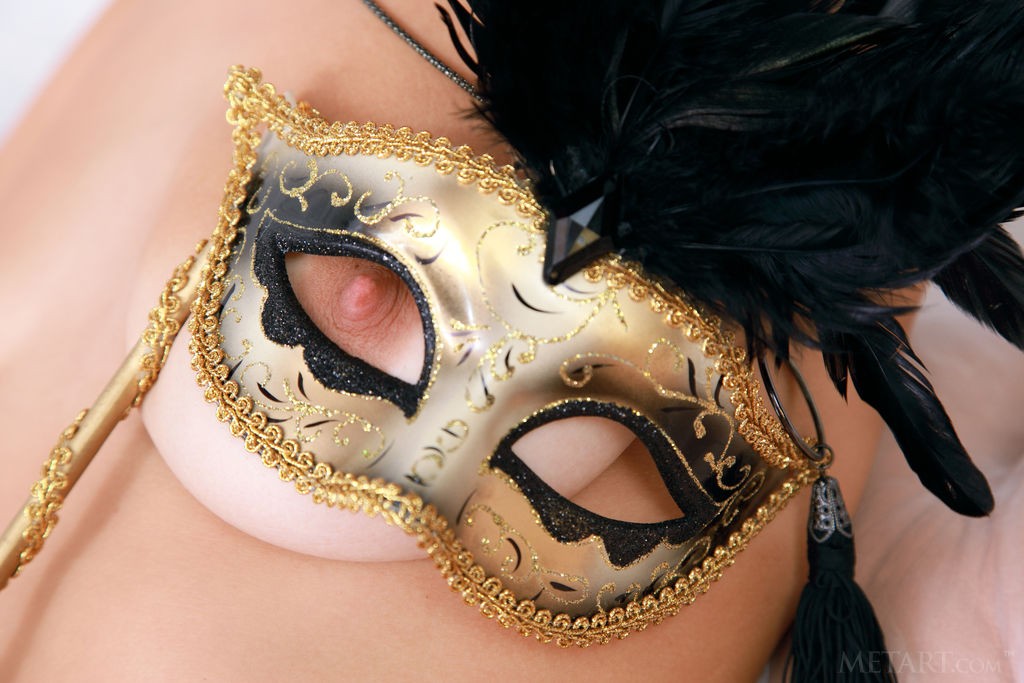 Violla A - Red-haired babe hides her shaved pussy under a mask