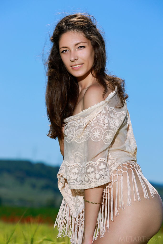 Rosella - Naked outdoors, she loves the feel of soft grass on her ass