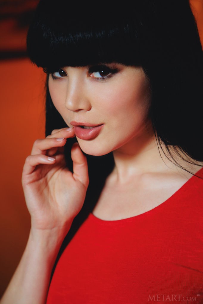 Malena - Asian beauty with a round rump takes off her dress