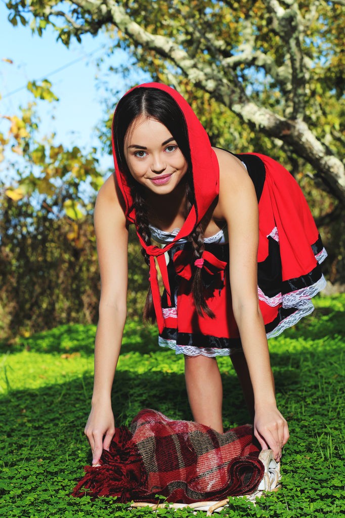 Li Moon - Little Red Riding Hood shows her very tight, shaved pussy