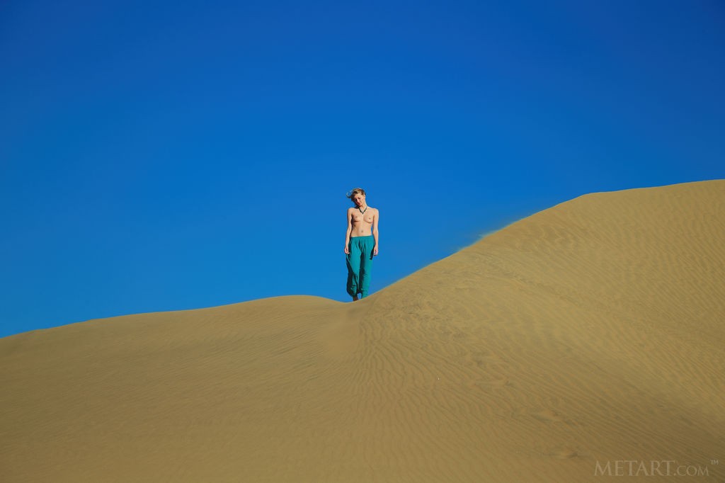 Mila I - Scorching hot redhead getting naked in the desert