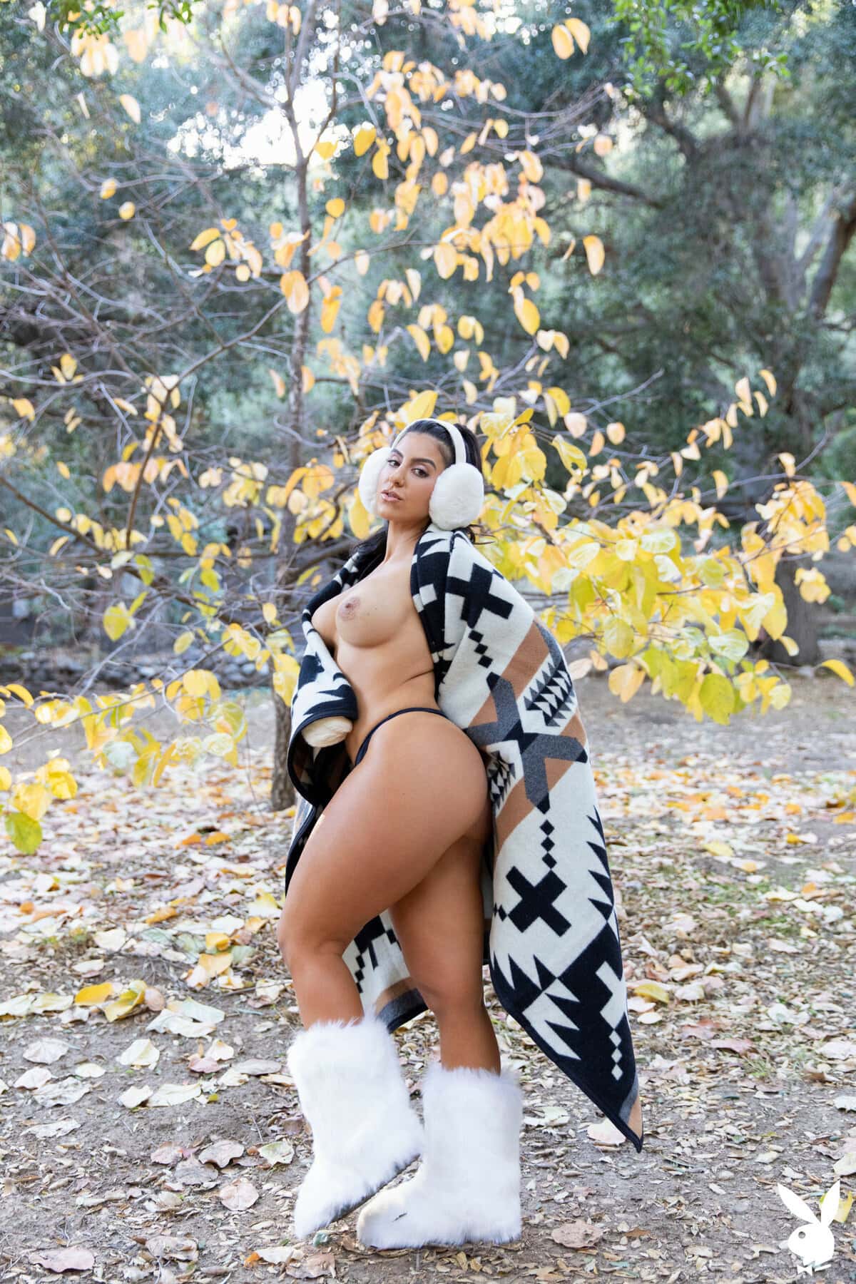 Lena The Plug looks sensual as she seductively unveils her big breasts outdoors