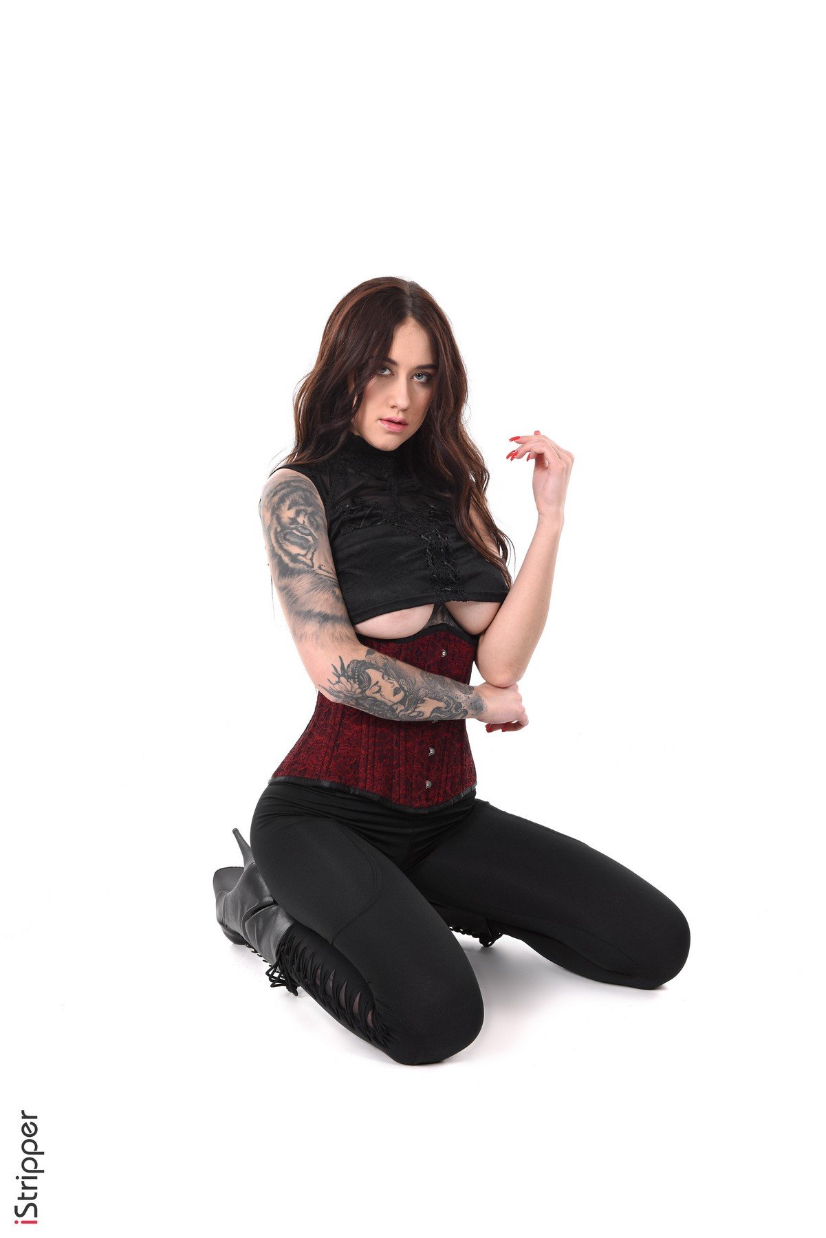 Stunning brunette Tanya Bahtina undressing her gothic outfit